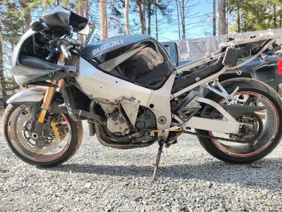 Parting out 01 Suzuki gsxr 1000. Let me know what your looking for. Bike is in 1 peice. Will sell co...
