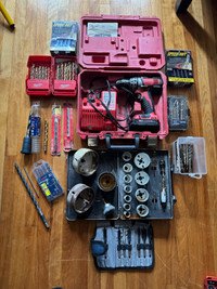 Milwaukee 1/2” M-18 drill/driver with many accessories 