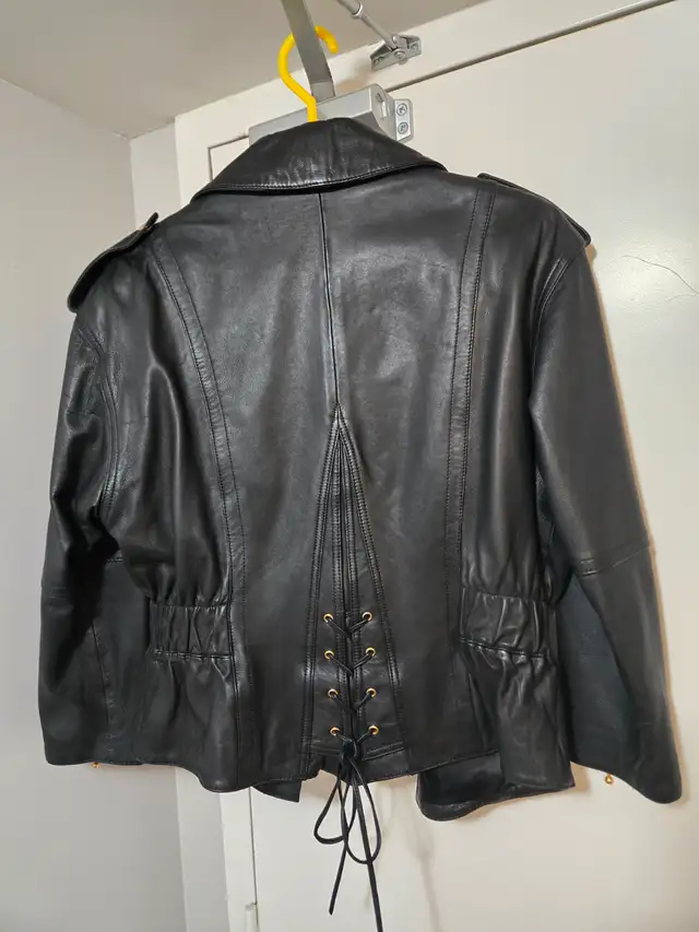 Like New Danier womans extra small black leather biker jacket62863731097730123