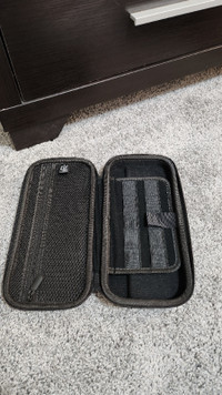 Nintendo switch slightly used with travel case and two games