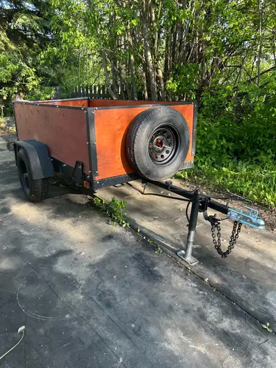 This is a 4’X8’ utility trailer with a 2” hitch and spare tire in excellent condition.