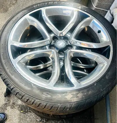 Durable set of OEM Ford Edge Sport Wheels 22 inch with Maxxis Victra Z4S tires mounted on 22-inch ch...