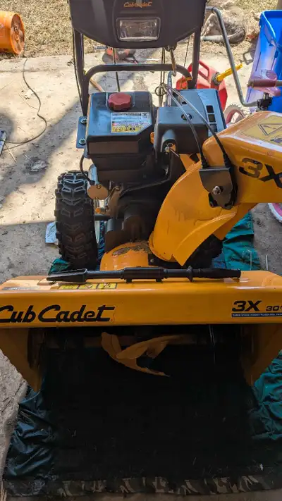 30" Cub Cadet Heavy Duty Snowblower, has electric start and hand warmers. Engine runs but needs work...