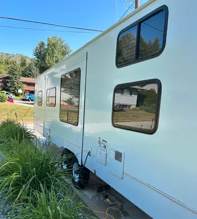Freshly buffed & waxed! You will not find a cleaner trailer! Original owners. Sleeps 10. Twin sized...