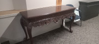 Carved solid mahogany side board.