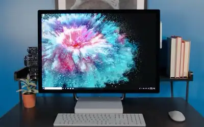 This is a used Microsoft Surface Studio 1 all-in-one desktop computer, boasting a vibrant display an...