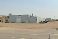 20,000 SF Industrial Shop with 1.5 Acre Yard and Cranes