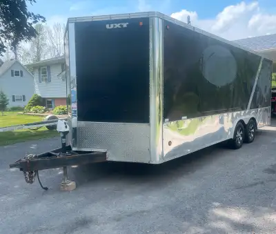 2008 united express line enclosed cargo trailer. 22 ft. Re sealed last year, electric jack, e track...