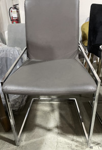 Grey dining chair with silver base