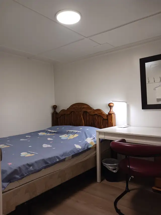 A brand new private day room with a queen-size bed