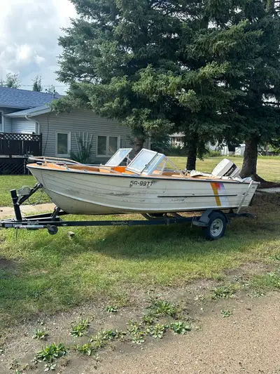 16’ fishing boat with a 70 Horse 2 stroke. Trailer is newer then the boat. It comes with 2 life jack...