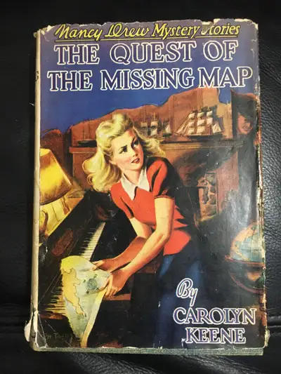 Vintage Nancy Drew hardcover book. Cloth cover, with dust jacket. Blue "digger" endpapers. Dust jack...