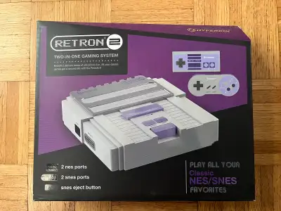Play all your classic favorites in the RetroN 2 two-in-one system! Compatible with NES® and Super ®c...