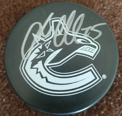 Autographed Hockey Puck Vancouver  Canucks, View more