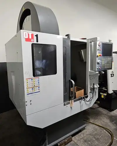 2012 Haas DT-1 TRAVELS: X AXIS: 20" Y AXIS: 16" Z AXIS: 15.5" TABLE: LENGTH: 26" x 15” MAX. WEIGHT O...