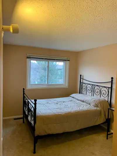 Bedroom part of 3 bedroom house Two washrooms, laundry room, dining and living room. House located a...