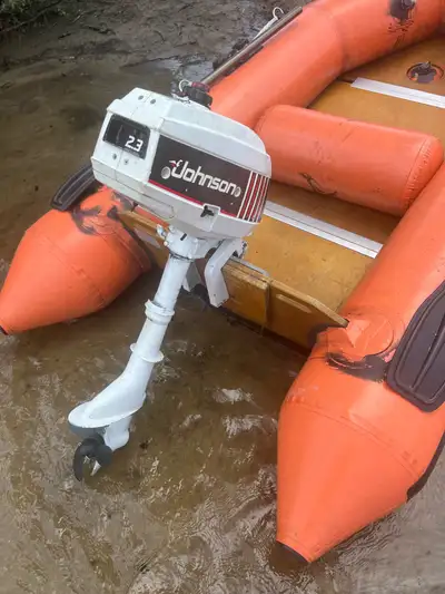 Johnson 2.3 HP old school outboard motor in running condition with manual. This motor is circa 1992...