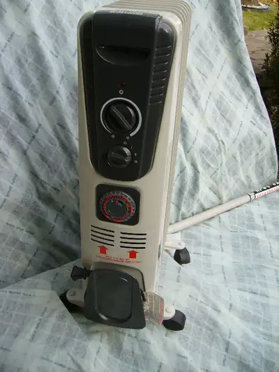 Radiateur genre calorifere (Intertek) elec. 1500W avec timer., View more