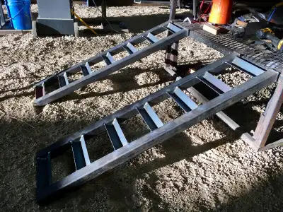 Custom steel ramps BUILT TO ORDER. We sell light, medium, and heavy duty ramps. Safe capacities: Lig...
