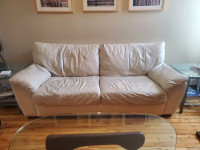 Very comfortable cream coloured leather couch