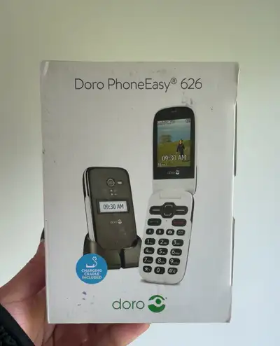 Doro, easy flip phone. Designed to be senior friendly. Has large buttons and font size. New, never u...