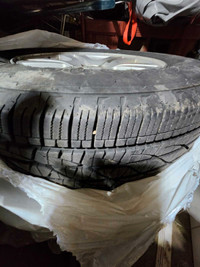 Set of 4 all season tires on rims