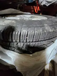 Set of 4 Firestone all season tires on rims
