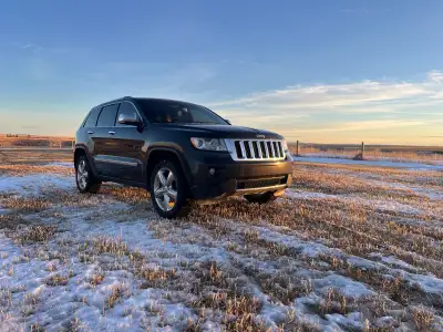 JUST REDUCED!! Beautiful 2011 Jeep Grand Cherokee Overland Edition for sale This jeep has been amazi...