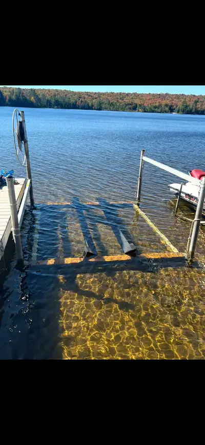 Shore Station aluminum vertical boat lift adjustable for deep and shallow water. It was used in Musk...