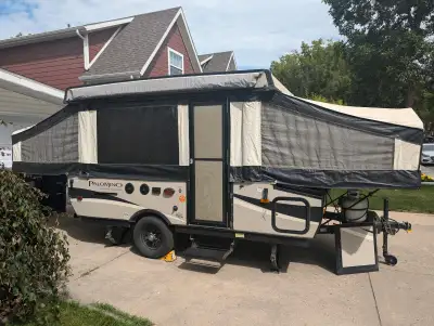 2017 Palomino T10ST tent trailer for sale. Queen bed up front, double bed in rear, dinette and couch...