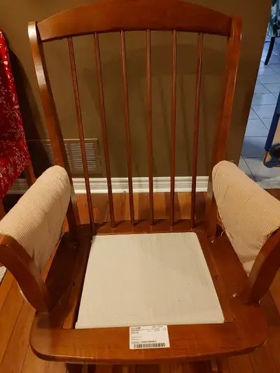 Made in Canada with quality hardwood and craftsmanship, this Dutailier rocking chair is very sturdy,...