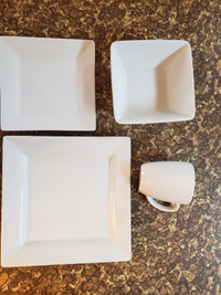 Set of white dinner ware