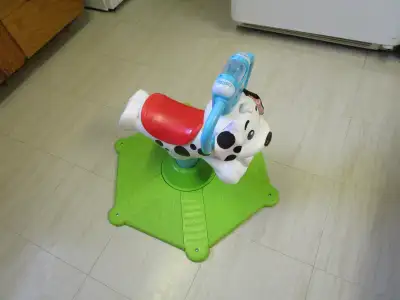 for child 12 months and older ride on and spins plays music and talks , teaches numbers , ABC and co...