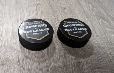 Two Brand New Hockey Pucks, View more