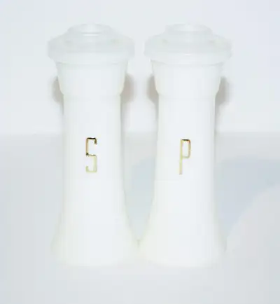 Tupperware hourglass-shape salt & pepper shakers with flip lids, View more