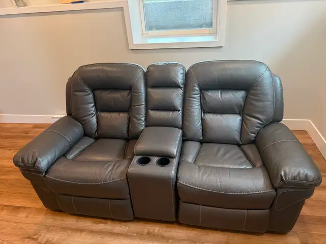 Leather reclining and rocking sofa. in Chairs & Recliners in Charlottetown - Image 3