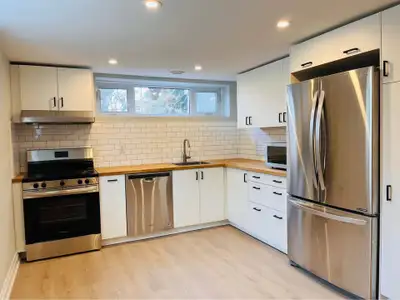 The Unit 2 spacious bedrooms 1 full bathroom — brand new Modern kitchen with new appliances Brand ne...