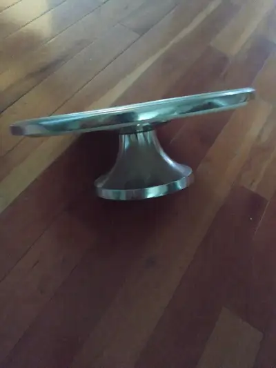 White surface, easy clean Silver tone trim cake server/ display base $25 Cake lifter with bottom mea...