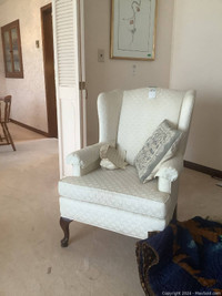 Beautiful Ivory Wing Chairs on Auction