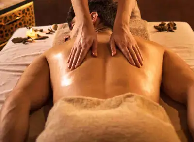 Female massage therapist offering mobile massage, View more
