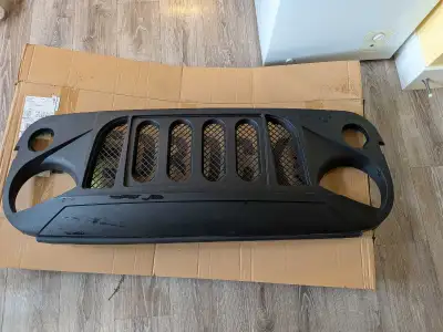 RedRock Avenger Grille; Matte Black (07-18 Jeep Wrangler JK) A small component is loose on the grill...