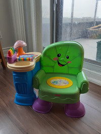Fisher Price Laugh and Learn Smart Chair plays songs reads book