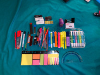 School supplies. Stationary, binders, desk lamp light, backpack