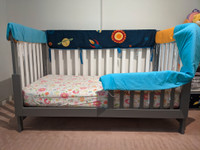 Full crib with accessories and toddler rail