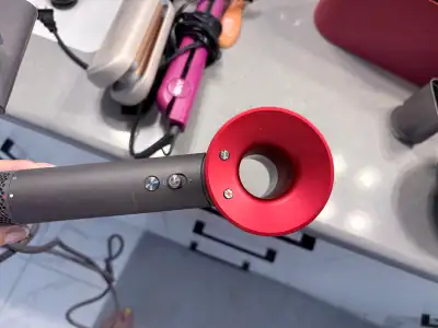 Selling my used Dyson Supersonic hair dryer, known for its fast drying and intelligent heat control...