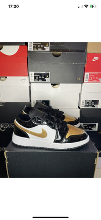 Jordan 1 low gold toe size 6y or 7.5 women and 7y or 8.5 women