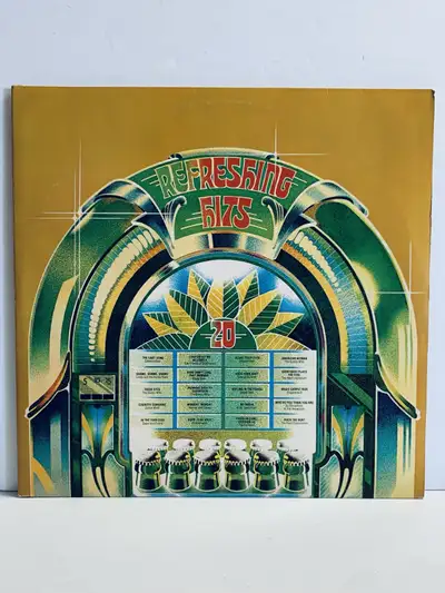 Get ready to groove with this vintage "Refreshing Favourites" vinyl record! This record features a c...