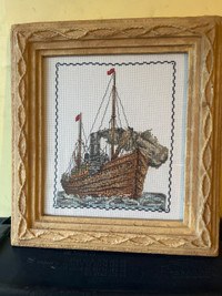 Cross-stitched picture of a ship
