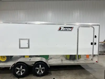 Triton 4 bed snowmobile trailer. Diesel heater, carbon flooring, 2 new spares, brand new brakes, hub...