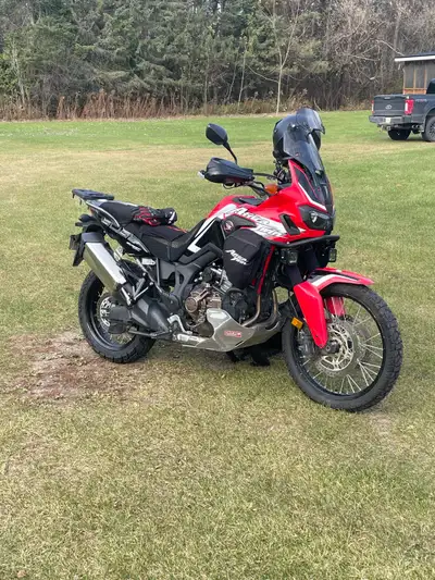 Selling my 2017 Honda African Twin DCT, a versatile adventure motorcycle that's ready for anything!...
